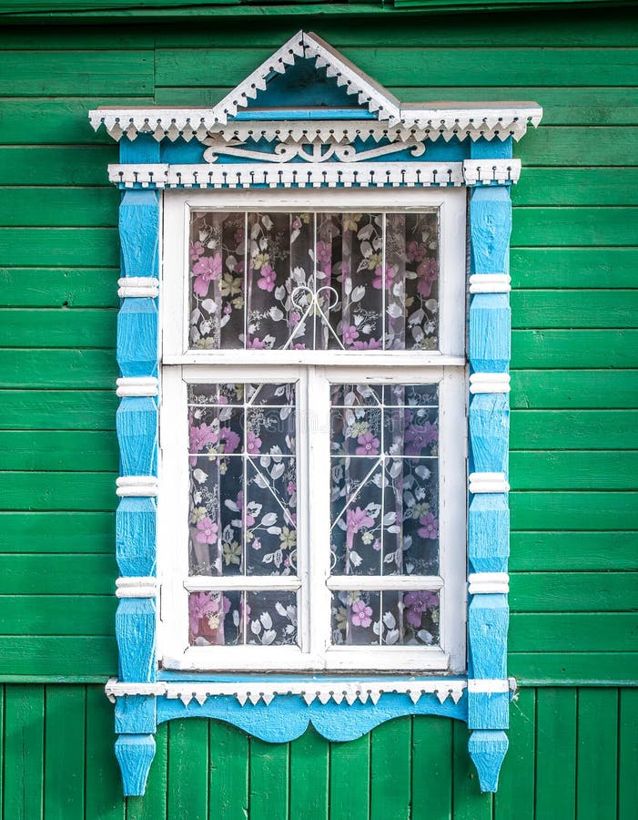 Window of old traditional russian wooden house.