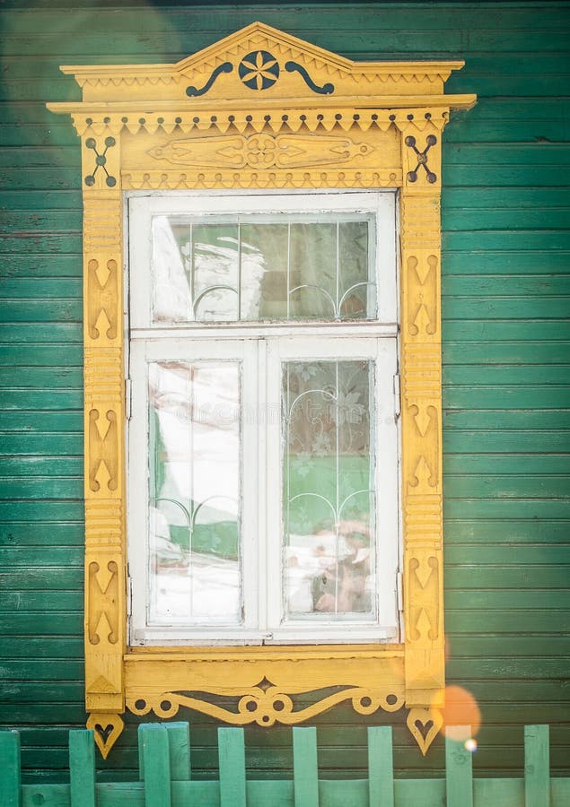 Window of old traditional russian wooden house.