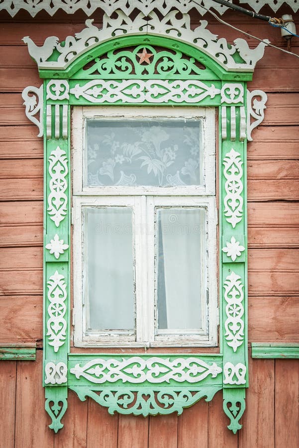 Window of old traditional russian wooden house.