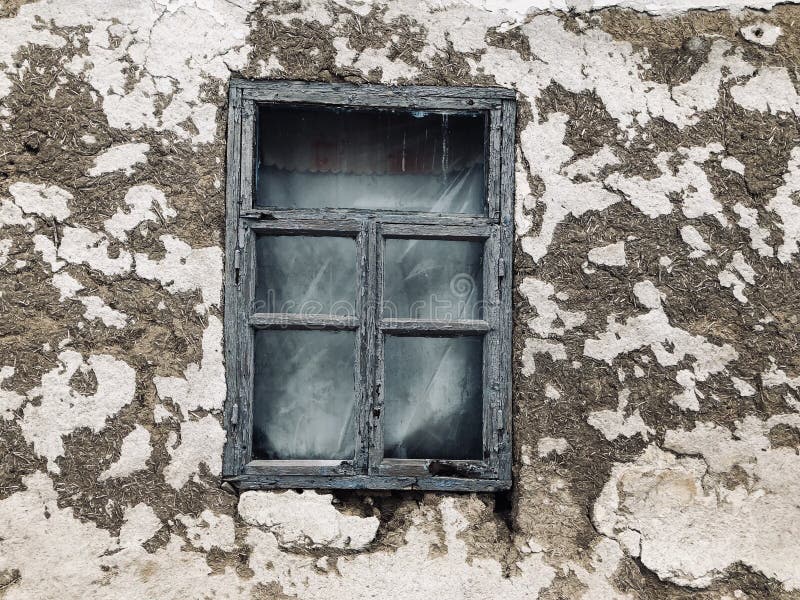 Window of an old Ukrainian ruined house stock photography Window of an old Ukrainian ruined house stock photography