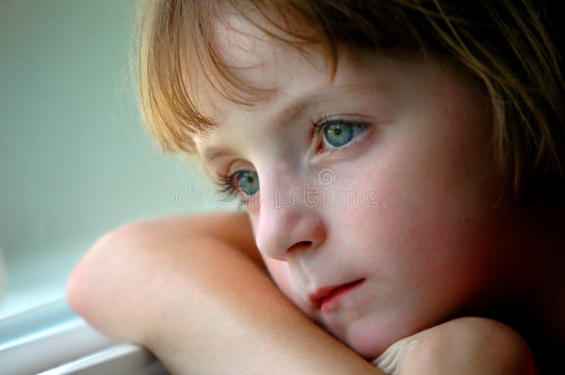 Window Portrait of Little Girl Looking Out