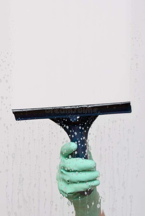 Window washer with squeegee royalty free stock photo