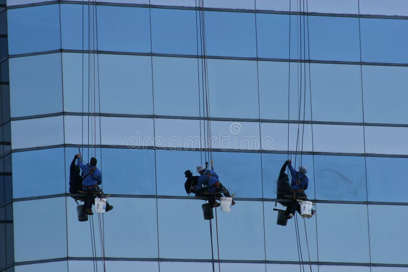 Window Washer Scaffold on Blue Angled Glass Stock Photo Image of