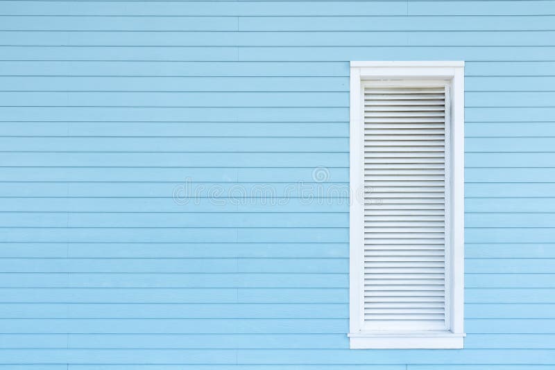 Window on wooden wall. Building abstract background