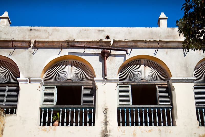 Windows on colonial building