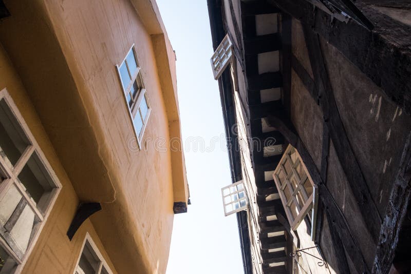 Overhanging windows in the medieval buildings of York Shambles, tudor houses. Overhanging windows in the medieval buildings of York Shambles, tudor houses