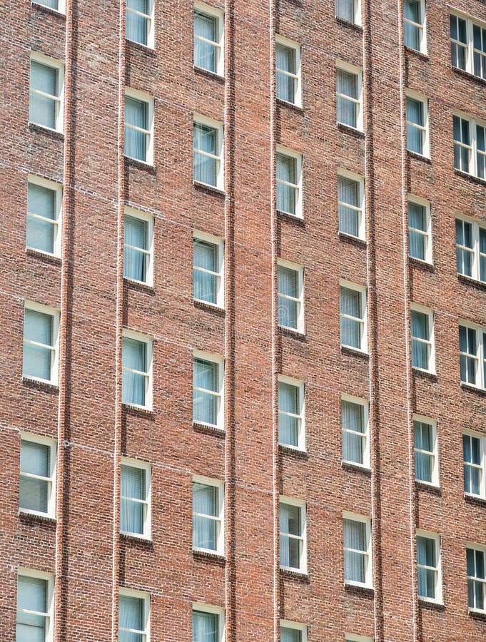 Windows on Red Brick Apartment Building Stock Photo - Image of