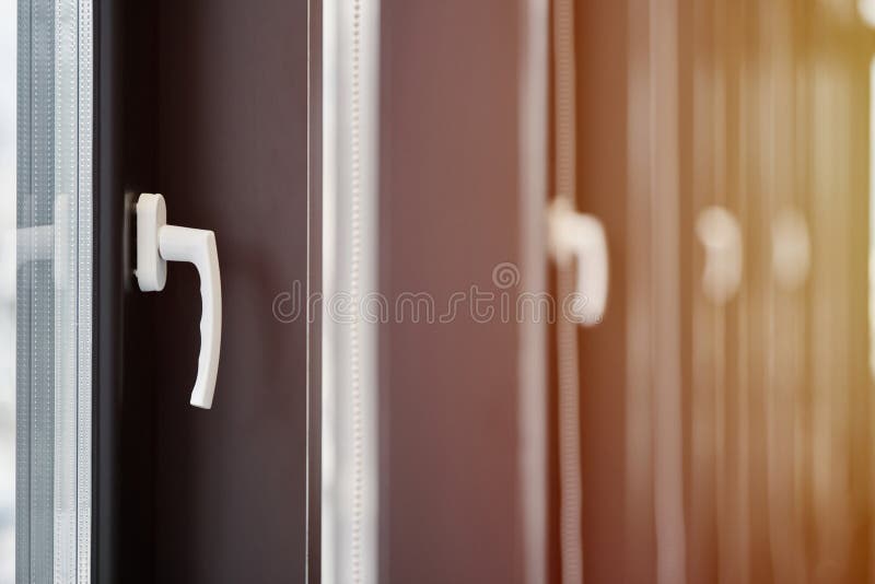 Windows row in office building. Modern windows with handles. Rows of windows in new apartment royalty free stock photo