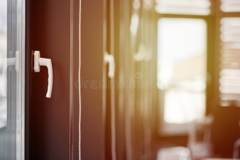 Windows row in office building. Modern windows with handles. Rows of windows in new apartment royalty free stock images