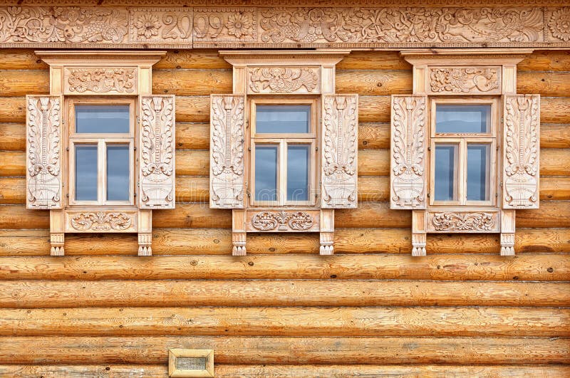 Windows on the wooden house facade. Old Russian country style