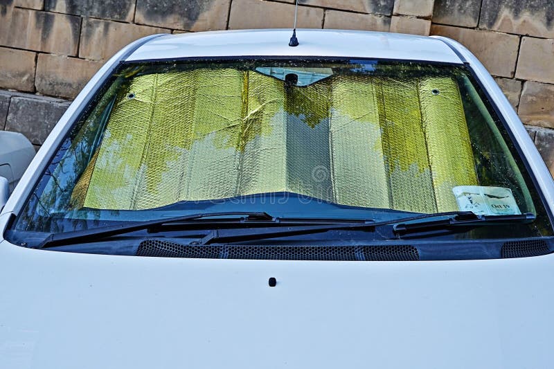 Windshield of Car with Protective Reflective Sunscreen Surface Inside