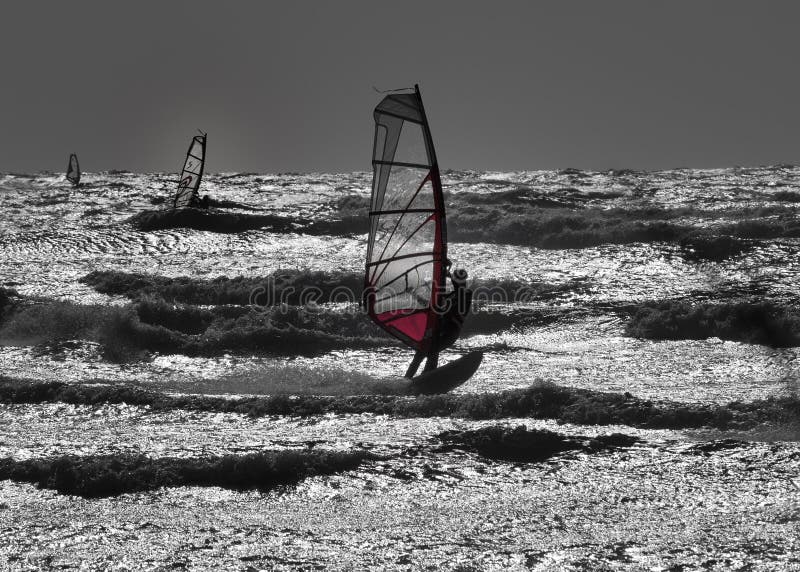 Windsurfers w akci zdjęcie stock Windsurfers w akci zdjęcie stock