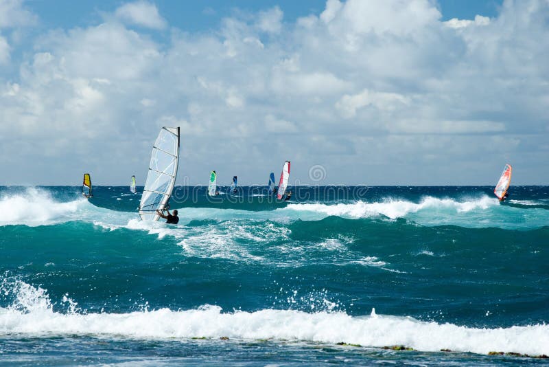 Windsurfers in windy weather on Maui Island royalty free stock photo Windsurfers in windy weather on Maui Island royalty free stock photo