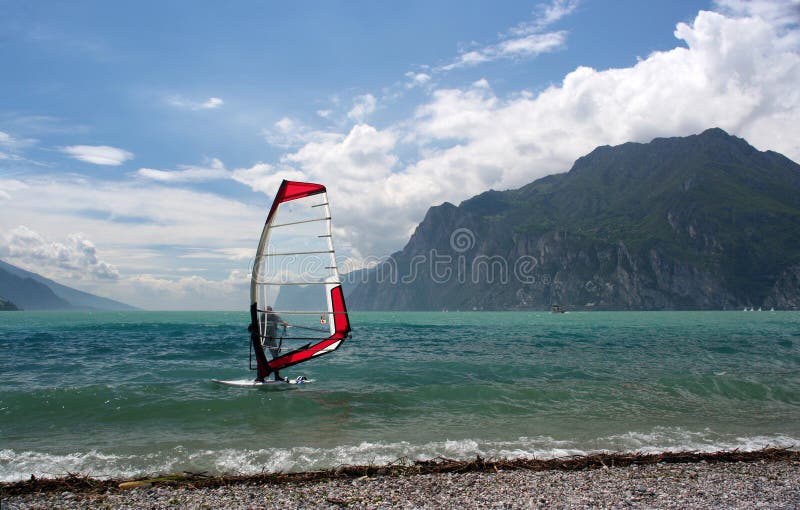Windsurfing on a lake stock photo. Image of activity 14340384