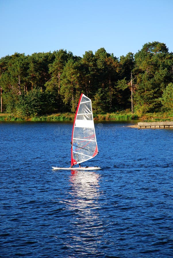 Windsurfing on a lake