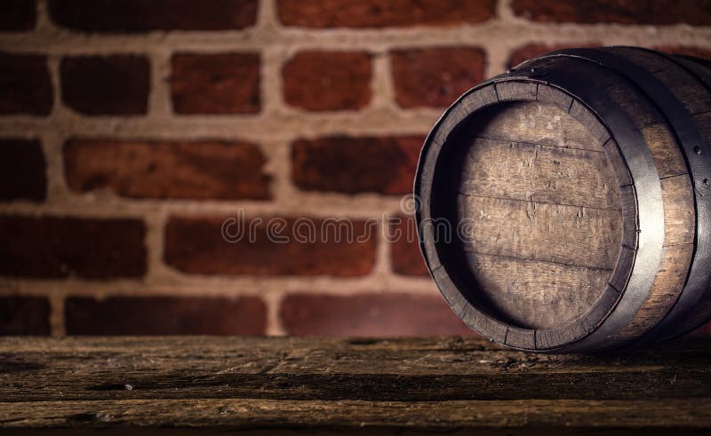 Wine beer cognac whiskey or rum barrel on wooden table