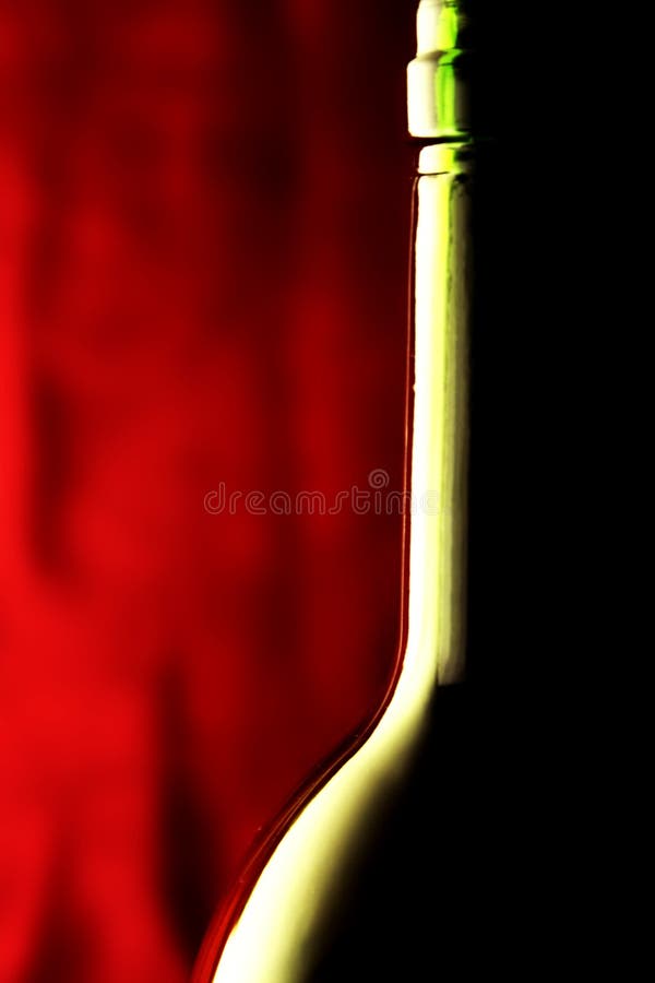 Wine bottle against a red background