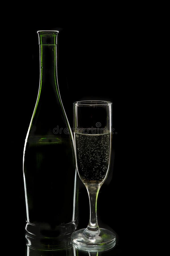 Old rum bottle and glass stock image. Image of alcoholism 5109017