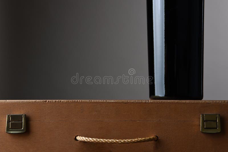 Wine Bottle on Wood Case stock photo. Image of horizontal 92212422