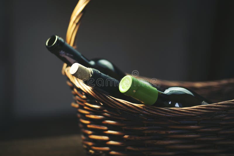 Wine bottols on basket royalty free stock photos
