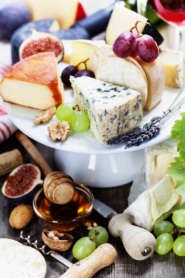 Wine and cheese plate stock photo. Image of group, gourmet 34568232