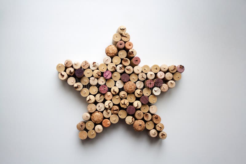 Wine corks star shaped composition from above. Wine corks star shaped composition isolated on white from a high angle view royalty free stock photos Wine corks star shaped composition from above. Wine corks star shaped composition isolated on white from a high angle view royalty free stock photos
