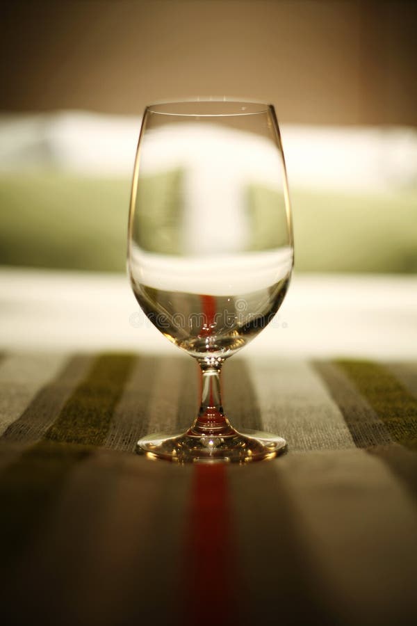 Wine glass on bed stock photo. Image of high, white, inside 16924570