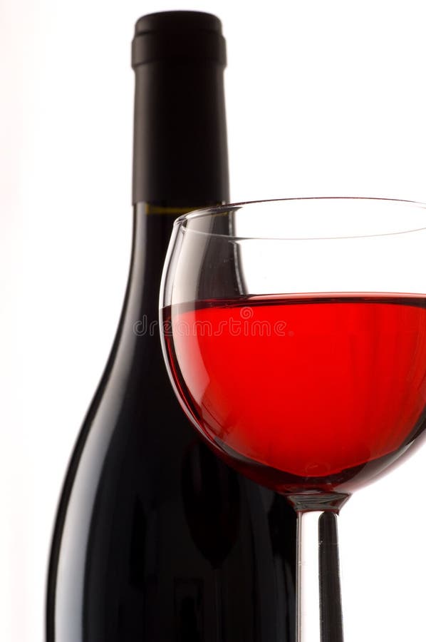 Bottle and Glass with Red Wine, Red Wine Splash, Wine Pouring on Table