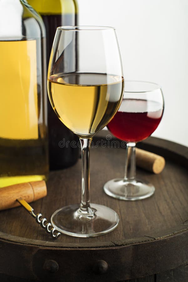 Wine bootle and glass on white stock photography