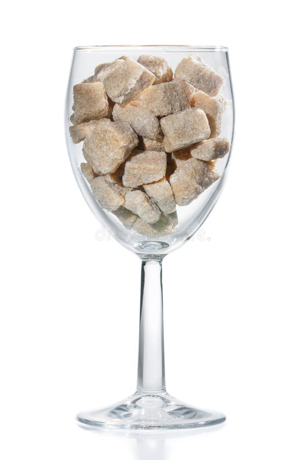Wine glass of brown sugar. stock photo. Image of closeup 25360296