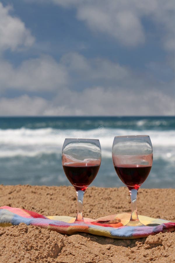 Wine glasses at the beach stock photo. Image of beverages 6492262