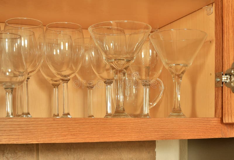 Cupboard with glasses stock photo. Image of kitchen, transparent 38955204