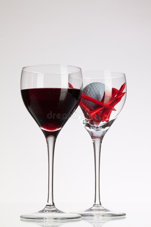 Wine Glasses with Red Wine and Golf Ball Stock Image Image of ball
