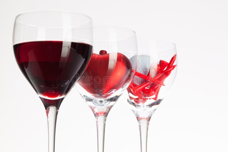 Wine Glasses with Red Wine, Heart and Golf Ball Stock Image Image of
