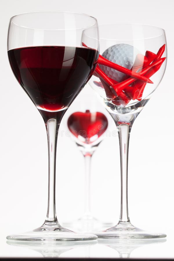Wine Glasses with Red Wine, Heart and Golf Ball Stock Image Image of