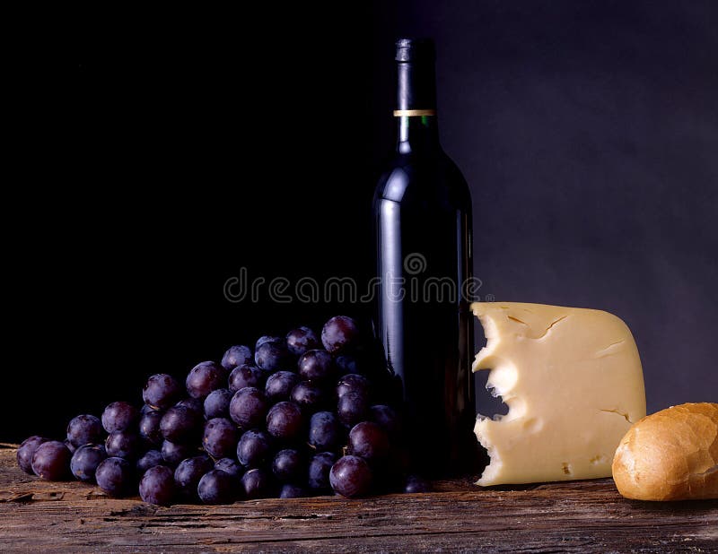 Wine, grapes, cheese and bread