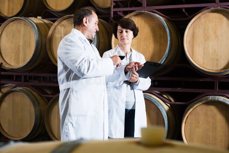 Wine maker with wineglass stock photo. Image of industry 81082066