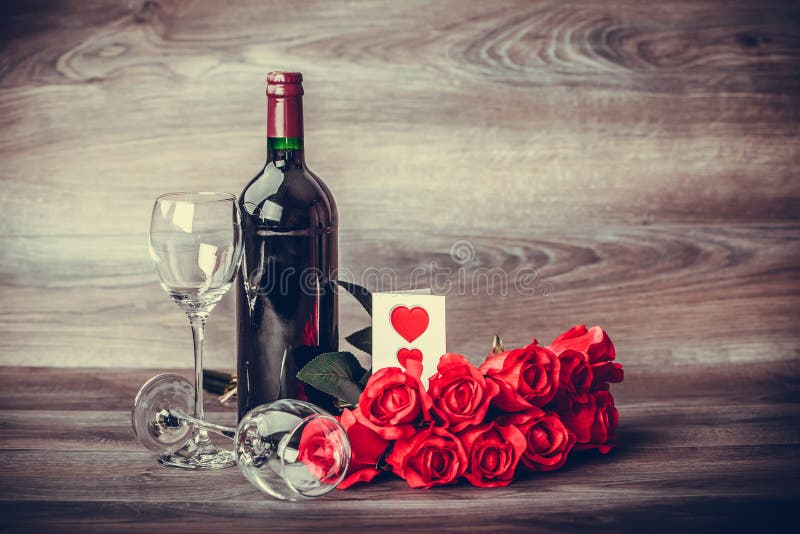 Wine and red roses stock photography Wine and red roses stock photography