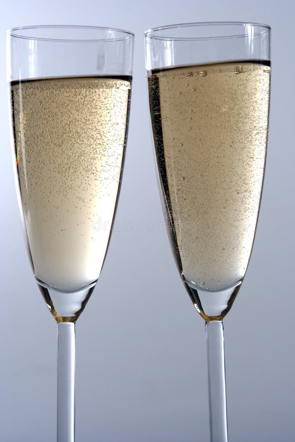 Wineglass of champagne isolated in white background