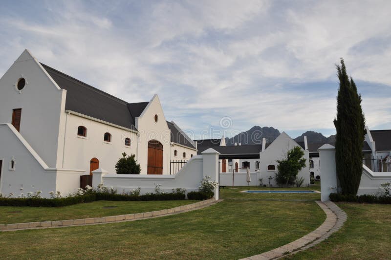 Cape dutch homestead vineyard in cape town stellenbosch on the wineroute southafrica in africa. Cape dutch homestead vineyard in cape town stellenbosch on the wineroute southafrica in africa