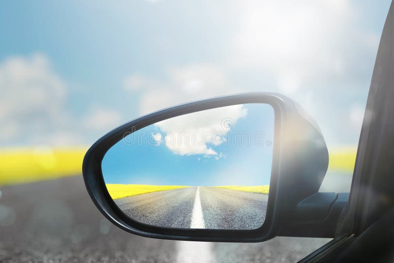 Wing Mirror of a Car with Beautiful Panorama Reflected Stock Image