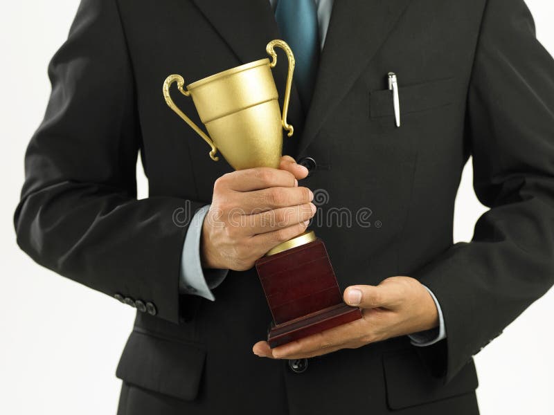 Winner holding a throphy