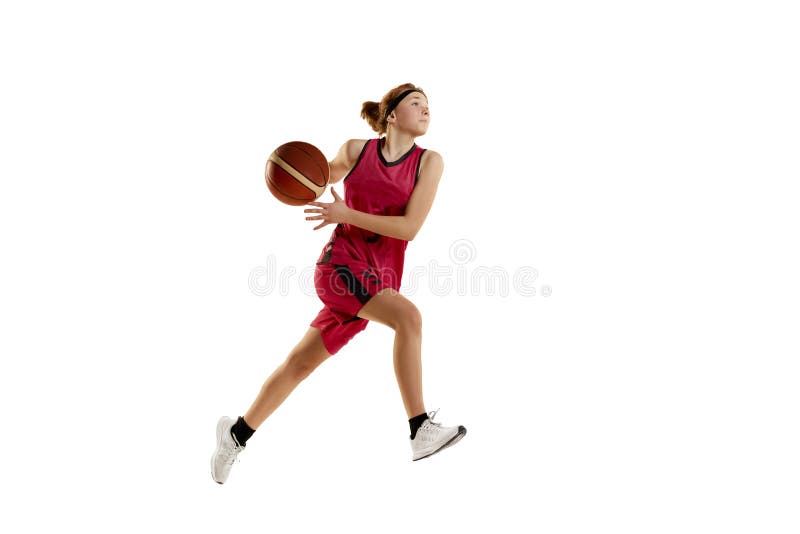 Winning final goal. Teen girl, basketball player in motion, playing isolated over white studio background. Concept of