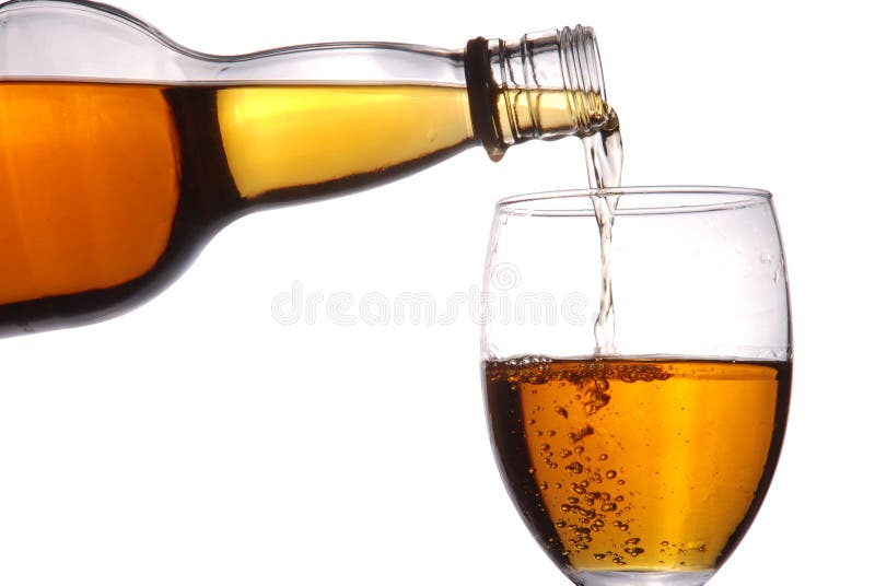 Champagne in a wine bottle and glass on isolated background with clipping path. Champagne in a wine bottle and glass on isolated background with clipping path
