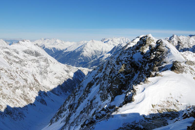 Winter Alpine mountains stock image. Image of tourist - 3198543