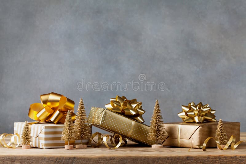 Winter banner with Christmas gift or present boxes and holiday decorations on wooden background. Greeting card. stock photos Winter banner with Christmas gift or present boxes and holiday decorations on wooden background. Greeting card. stock photos