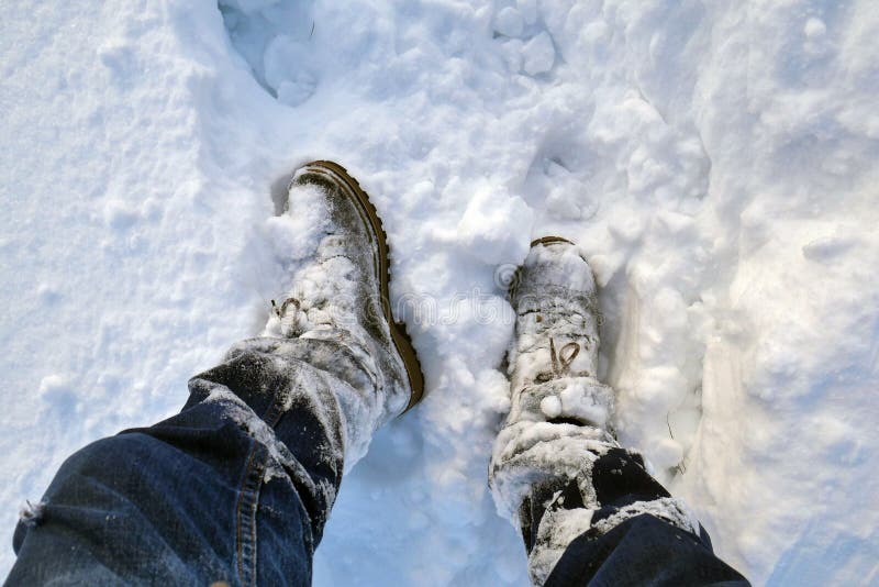 Winter Boots in the Snow, Closeup of Winter Shoes Stock Photo - Image ...