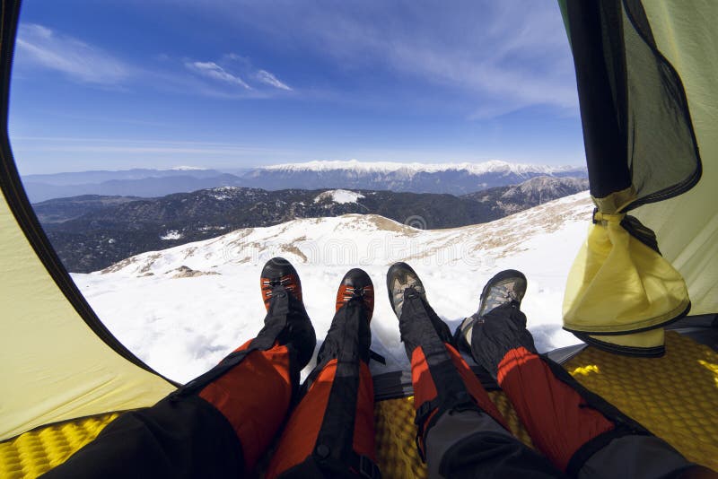 Winter Camping in the Mountains with a Backpack and Tent. Stock Photo