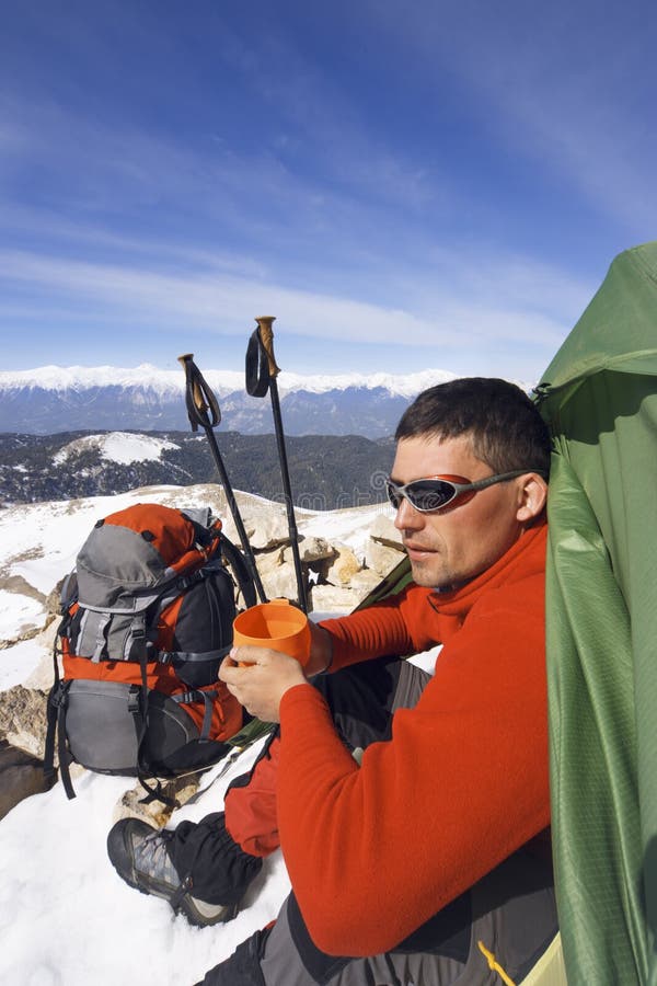 Winter Camping in the Mountains with a Backpack and Tent. Stock Image
