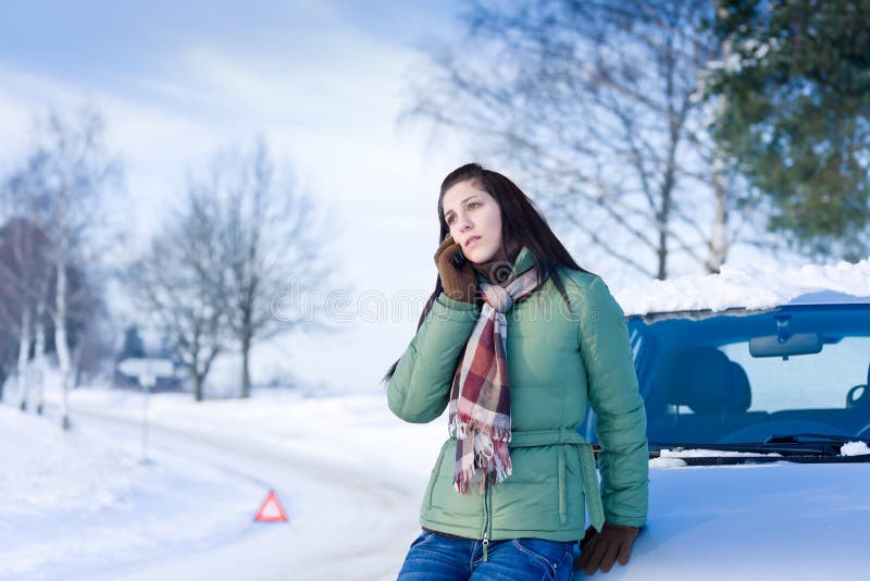Winter car breakdown - woman call for help royalty free stock images Winter car breakdown - woman call for help royalty free stock images